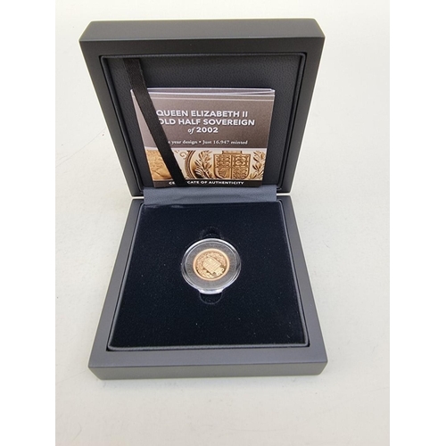 310 - Coins: an Elizabeth II 2002 proof gold half sovereign, with booklet, boxed.