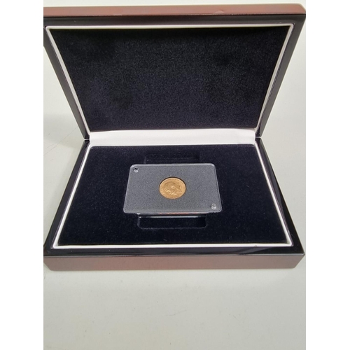 311 - Coins: a George V 1912 gold half sovereign, with CoA and box.