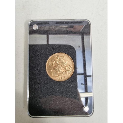 311 - Coins: a George V 1912 gold half sovereign, with CoA and box.