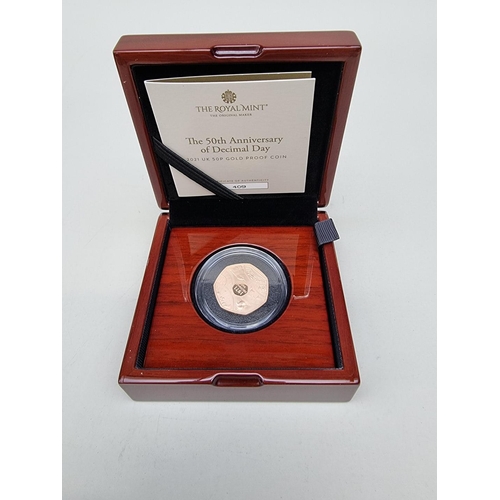 326 - Coins: a 2021 Royal Mint 'The 50th Anniversary of Decimal Day' 15.5g red gold proof limited edition ... 