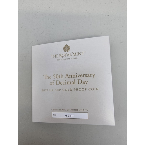 326 - Coins: a 2021 Royal Mint 'The 50th Anniversary of Decimal Day' 15.5g red gold proof limited edition ... 