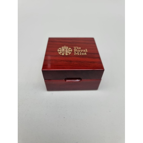 329 - Coins: a 2020 Royal Mint 'The Britannia' UK 1/4oz 24ct gold proof limited edition twenty five pound ... 