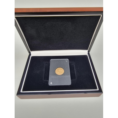 355 - Coins: an Victoria 1877 gold half sovereign, with box.