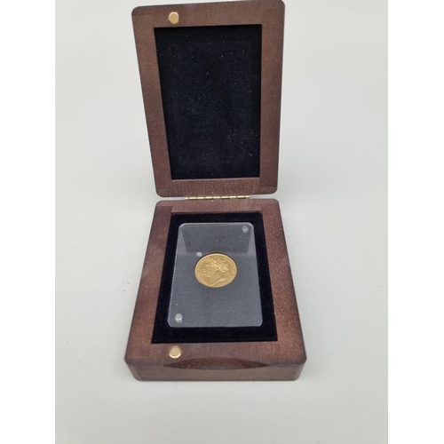 356 - Coins: an William IV 1822 gold sovereign, graded as very fine, with CoA and box.