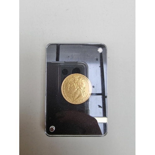 356 - Coins: an William IV 1822 gold sovereign, graded as very fine, with CoA and box.