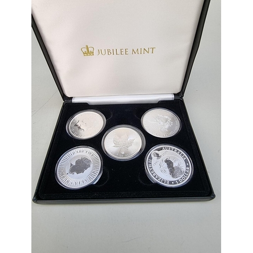 386 - Coins: a Jubilee Mint 'The 2020 Fine Silver Coin Collection' containing five fine silver 1oz coins f... 