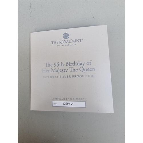 389 - Coins: a 2021 Royal Mint 'The 95th Birthday of Her Majesty The Queen' silver proof five pound coin, ... 