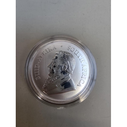 397 - Coins: a 2017 South African 1oz fine silver Krugerrand, premium uncirculated, boxed.... 