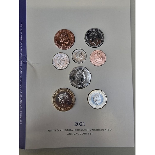 428 - Coins: a group of coins to include: a 2021 Royal Mint 'United Kingdom Brilliant Uncirculated Annual ... 