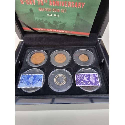 429 - Coins: 'The D-Day 75th Anniversary Coin Set', British coin set, comprising: twelve coins and two sta... 