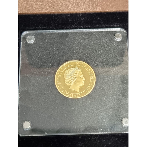 436 - Coins: a 2017 Niue Island 'John F Kennedy 1917-2017' commemorative .999 gold five dollars, 7.7g, box... 