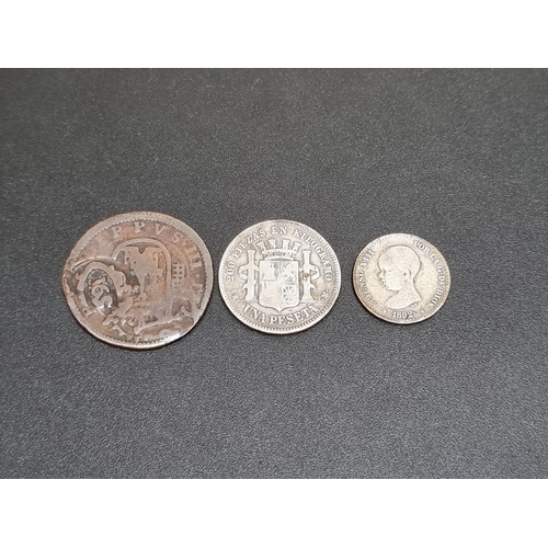 447 - Coins: a Spanish Phillip III counter struck 8 maravedis; together with two 19th century Spanish silv... 