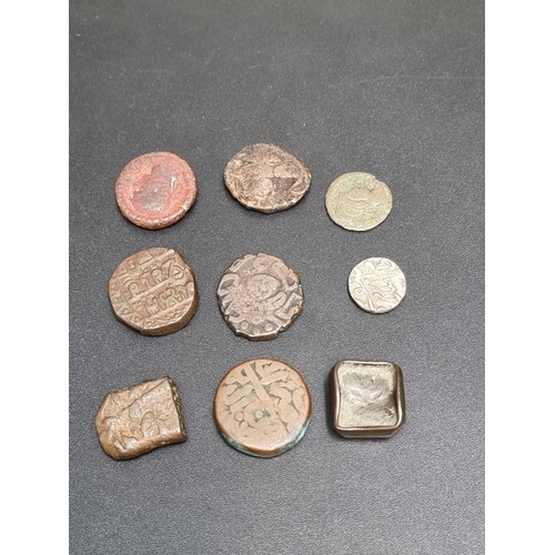 450 - Coins: seven Persian hammered coins.