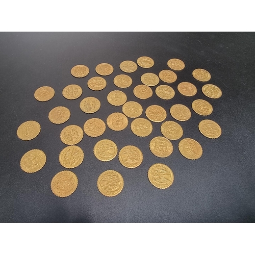 451 - Coins: thirty-nine gilt metal tokens.