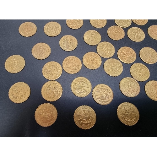 451 - Coins: thirty-nine gilt metal tokens.