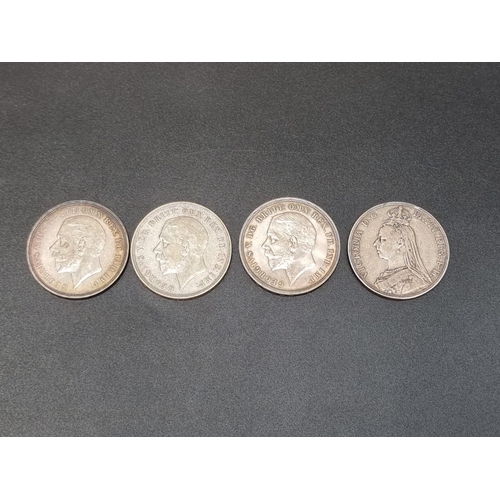 455 - Coins: a Victoria 1890 silver crown; together with three George VI 1935 rocking horse crowns. (4)... 