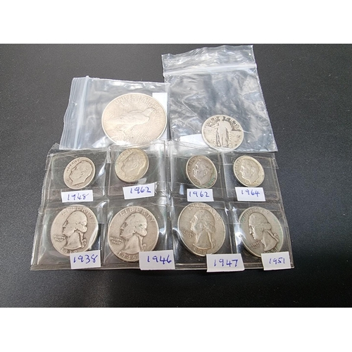 456 - Coins: ten US silver coins, to include a 1922 Peace dollar.