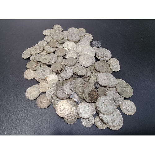 463 - Coins: a quantity of George V and George VI .500 silver coinage, 1060g.