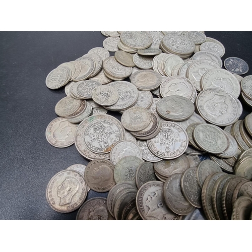 463 - Coins: a quantity of George V and George VI .500 silver coinage, 1060g.