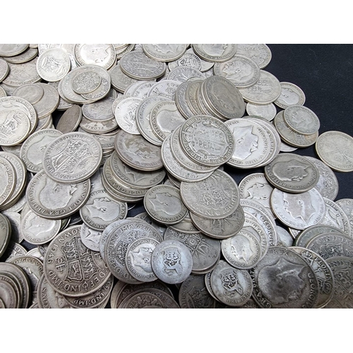 465 - Coins: a quantity of George V and George VI .500 silver coinage, 2474g