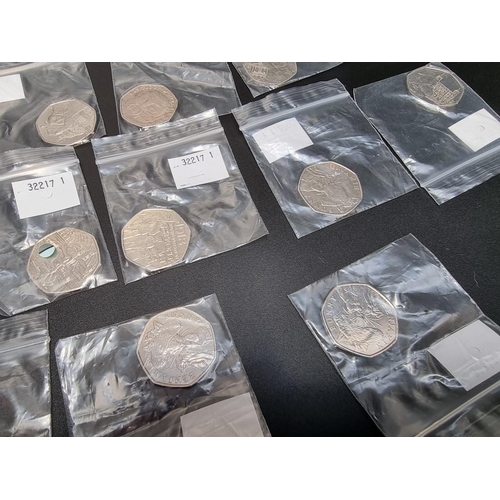 468 - Coins: thirty two Royal Mint collectable 50p coins, to include; Sherlock Holmes; Beatrix Potter and ... 