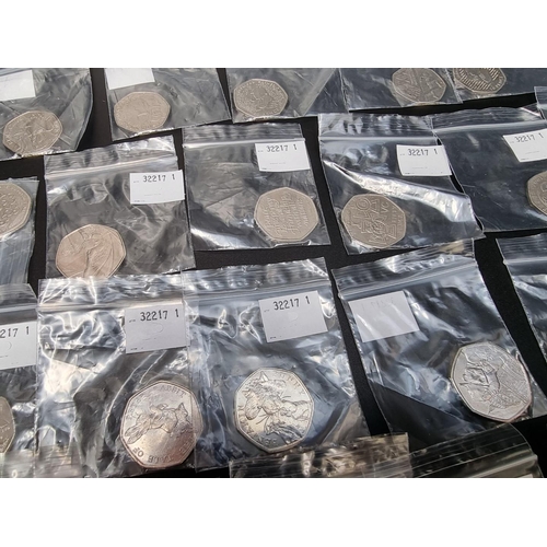 468 - Coins: thirty two Royal Mint collectable 50p coins, to include; Sherlock Holmes; Beatrix Potter and ... 