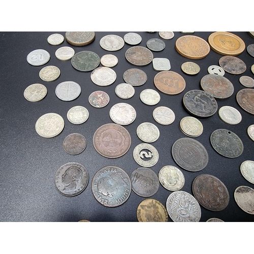 472 - Coins: a quantity of UK and world coins and tokens.