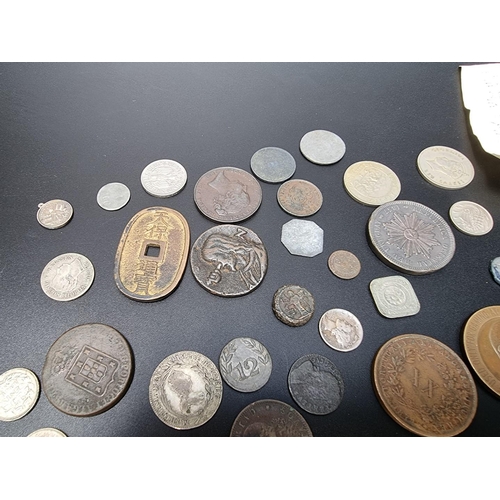 472 - Coins: a quantity of UK and world coins and tokens.