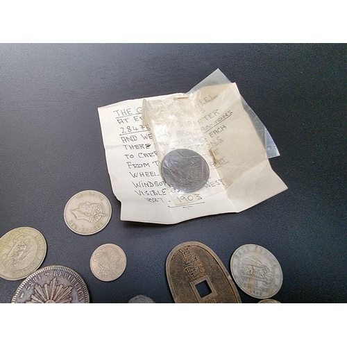 472 - Coins: a quantity of UK and world coins and tokens.