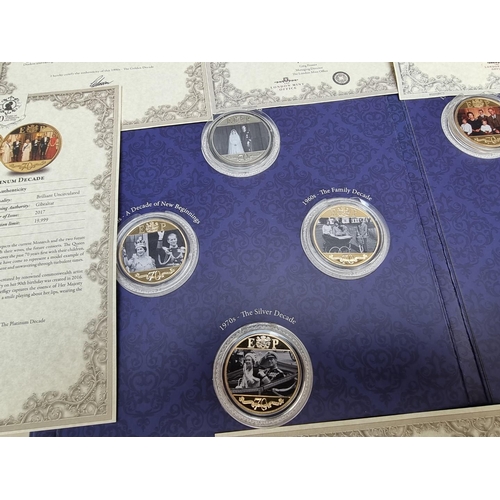 484 - Coins: a 2017 Gibraltar 'The Platinum Wedding Anniversary Photographic Collection', containing eight... 