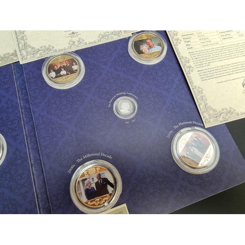 484 - Coins: a 2017 Gibraltar 'The Platinum Wedding Anniversary Photographic Collection', containing eight... 