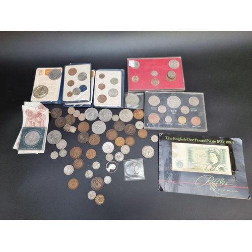 490 - Coins: a small collection of UK coins and bank notes; to include a few silver examples.... 