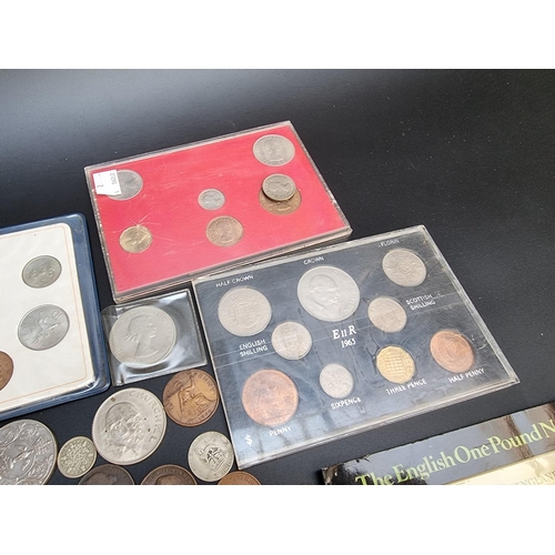 490 - Coins: a small collection of UK coins and bank notes; to include a few silver examples.... 