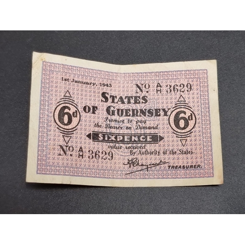 502 - Banknotes: a States of Guernsey German occupation sixpence note, dated 1st January 1943, serial No. ... 