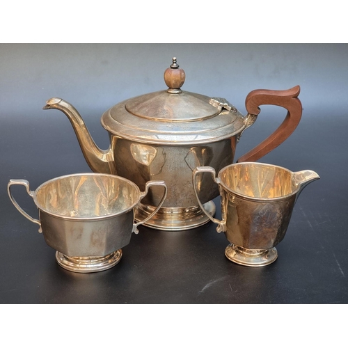 505 - A silver three piece bachelor's teaset, by Northern Goldsmiths Co, Birmingham 1933, gross weight 479... 