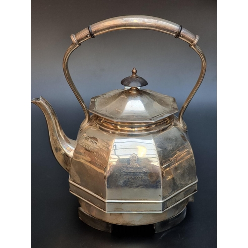 513 - An unusual silver electric kettle, by Walker & Hall, Sheffield 1934, engraved crest and motto, 2... 