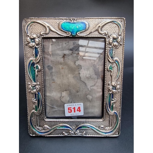 514 - An Art Nouveau silver and enamel photograph frame, by William Neale & Sons, Chester 1904, 19cm h... 