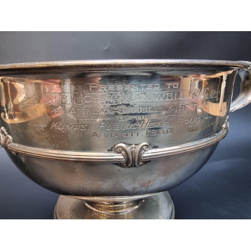 526 - A large Scottish silver twin handled pedestal bowl, by Hamilton & Inches, Edinburgh 1921, 26cm d... 