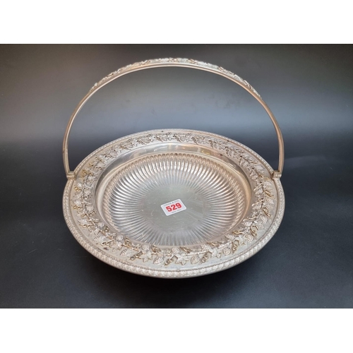 529 - An impressive silver swing handled basket, by Goldsmiths & Silversmiths Co Ltd, London 1925... 