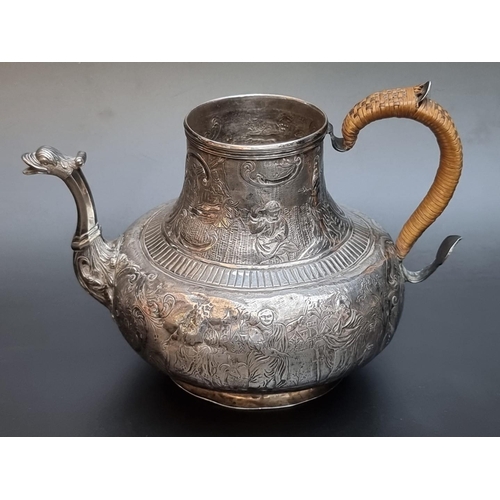 531 - A 18th century Dutch white metal teapot, having chased decoration, stamped 'Dewat' to base, 12cm hig... 