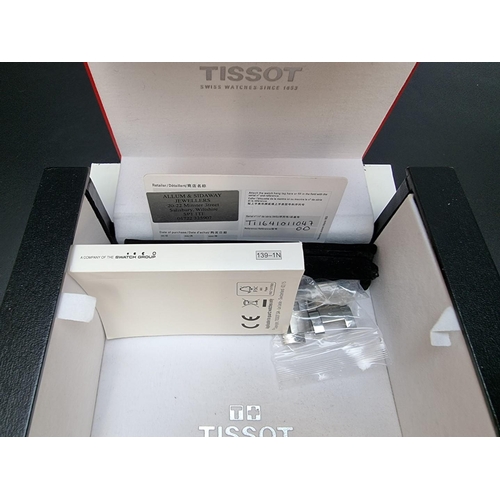 846 - A Tissot T Sport XL stainless steel quartz wristwatch, 42mm, with guarantee card dated 2021 and thre... 