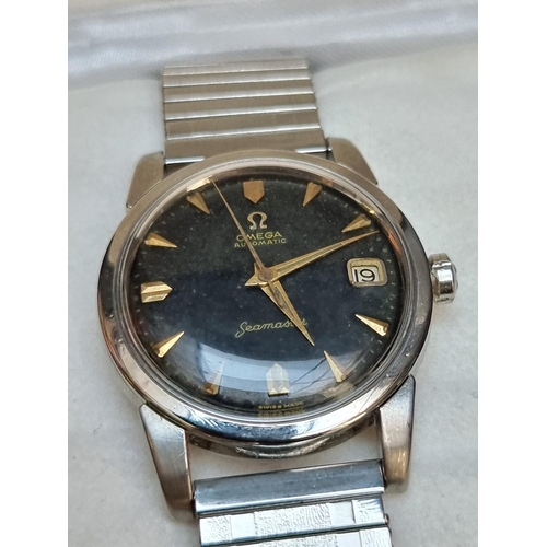 851 - A vintage Omega Seamaster stainless steel, automatic wristwatch, 34mm, on later expanding bracelet.... 