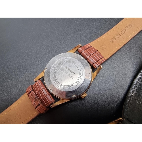 854 - A vintage Plaza gold topped automatic wristwatch, 34mm, on replacement leather strap; together with ... 