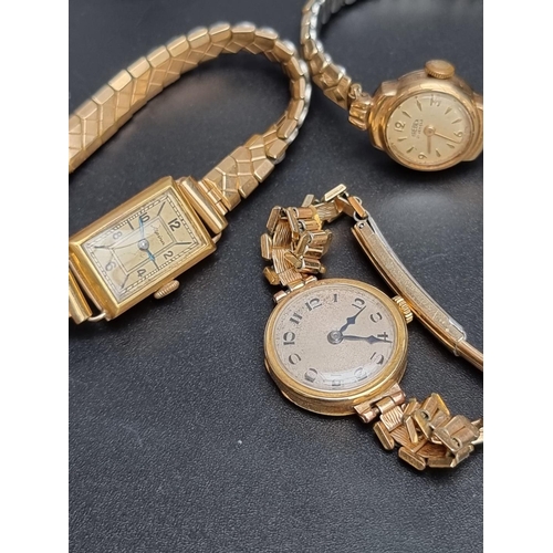 865 - A vintage Alpina 18ct gold ladies manual wind wristwatch, on plated expanding bracelet; together wit... 