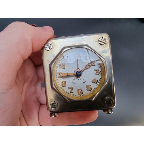 869 - A vintage Reveil alarm clock, 5.5cm high; together with a vintage Oriosa manual wind wristwatch, 32m... 