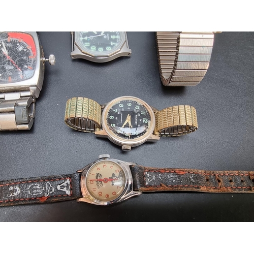 872 - A British Military W10/6645-31 quartz wristwatch, 36mm, no strap; together with six other wristwatch... 