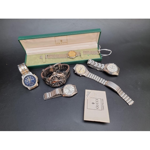 877 - A Gucci 9000M two tone quartz wristwatch, boxed; together with five Seiko wristwatches. (6)... 