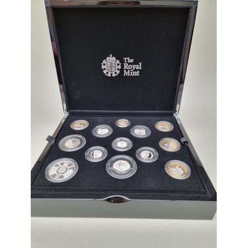 375A - Coins: a Royal Mint 2020 'The 2020 United Kingdom' silver proof coin set, containing thirteen coins,... 