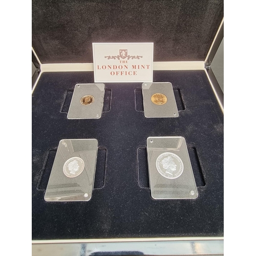 359 - Coins: a cased set of four Elizabeth II coins comprising: a 1963 brilliant uncirculated gold soverei... 