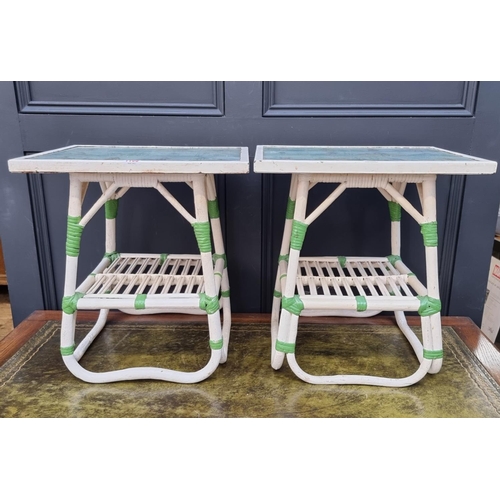 1103 - A pair of decorative tile inset low occasional tables, 43cm wide.